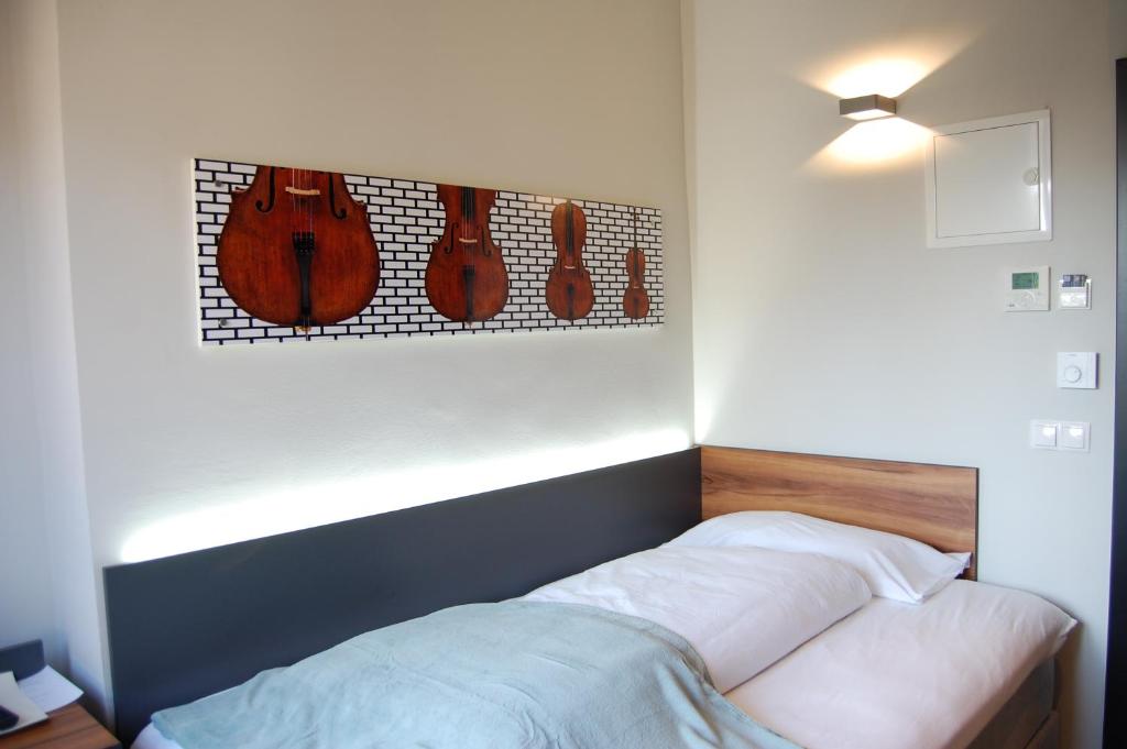 Postel nebo postele na pokoji v ubytování Apollo Hotel Vienna