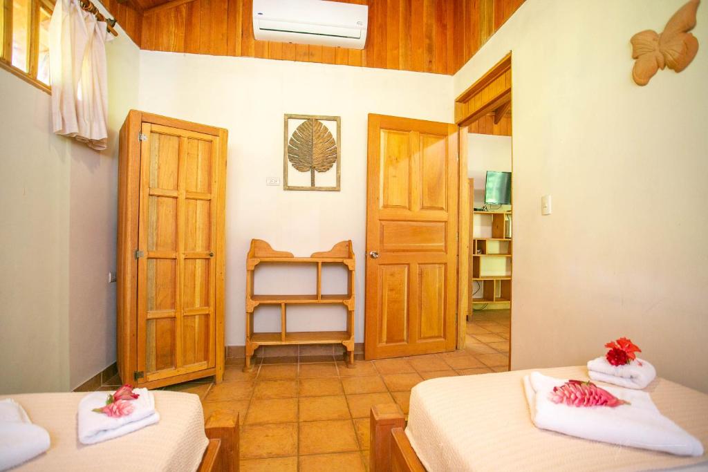 Postel nebo postele na pokoji v ubytování Hotel Casa Merlin