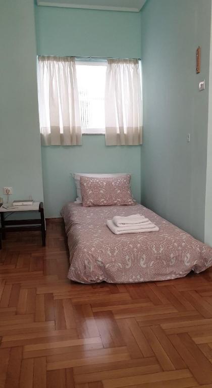 Posteľ alebo postele v izbe v ubytovaní Koukaki apartment near Acropolis