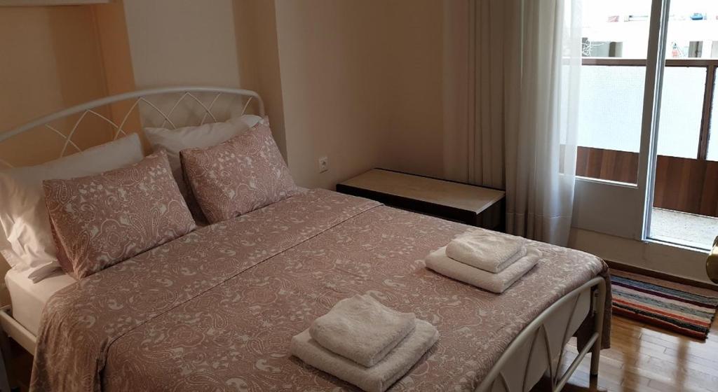 Posteľ alebo postele v izbe v ubytovaní Koukaki apartment near Acropolis