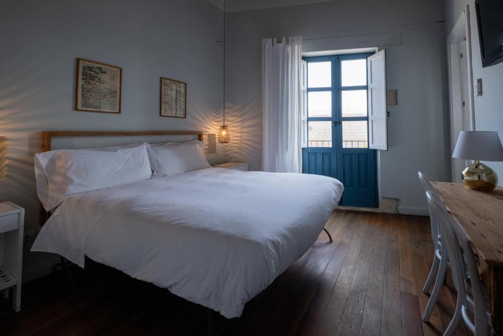 Postel nebo postele na pokoji v ubytování Hotel Gutkowski
