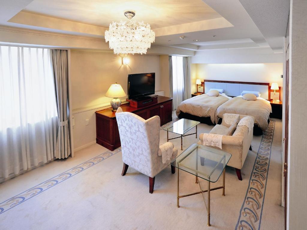 TV a/nebo společenská místnost v ubytování Bandai Silver Hotel
