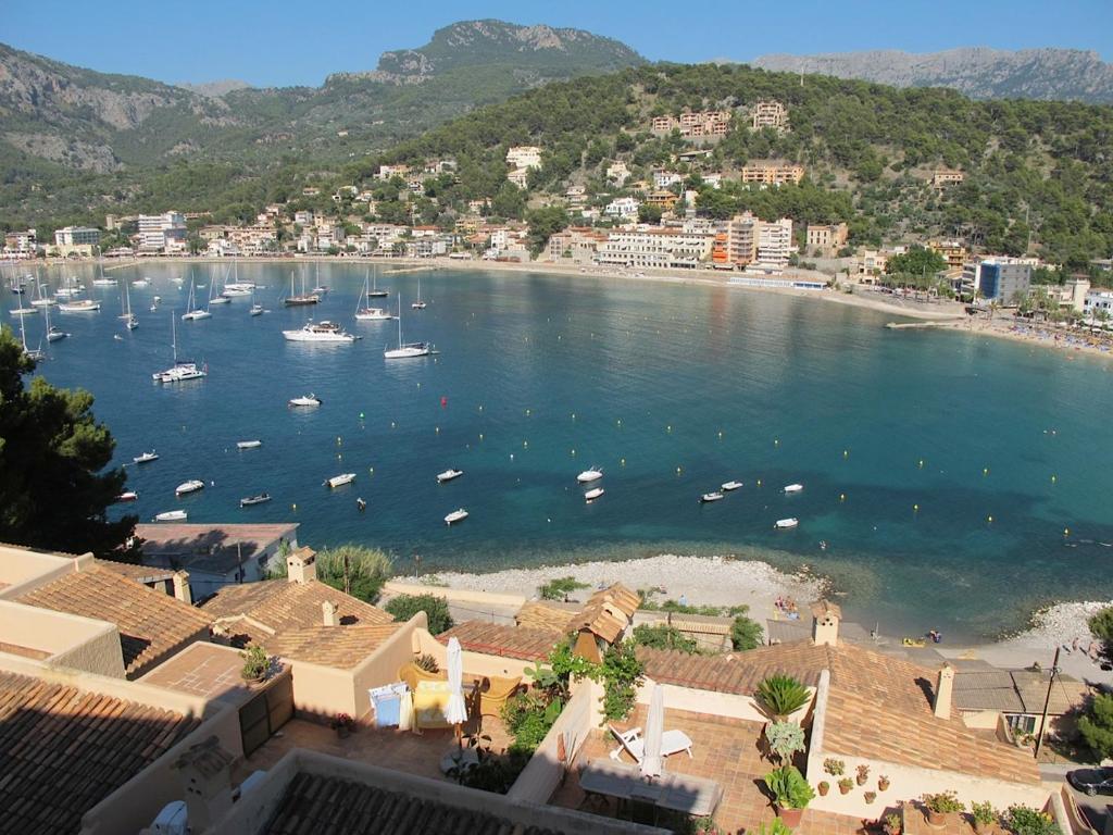 a view of a harbor with boats in the water at Traumblickwohnung Montemar 19 in Port de Soller