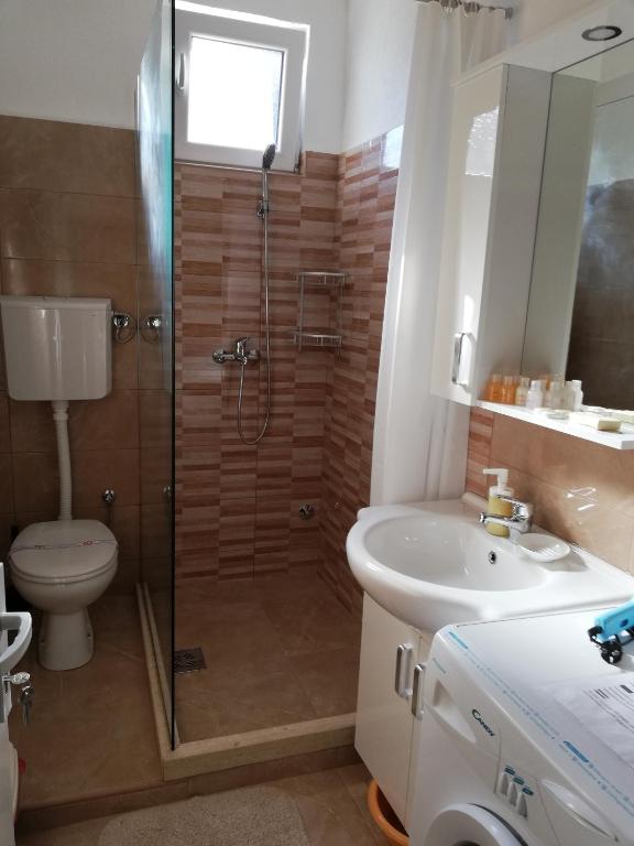 Koupelna v ubytování Apartments Zec