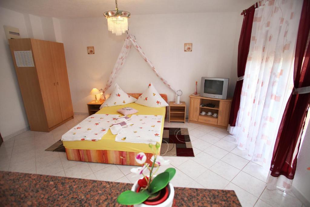 Een bed of bedden in een kamer bij Villa Adriatic