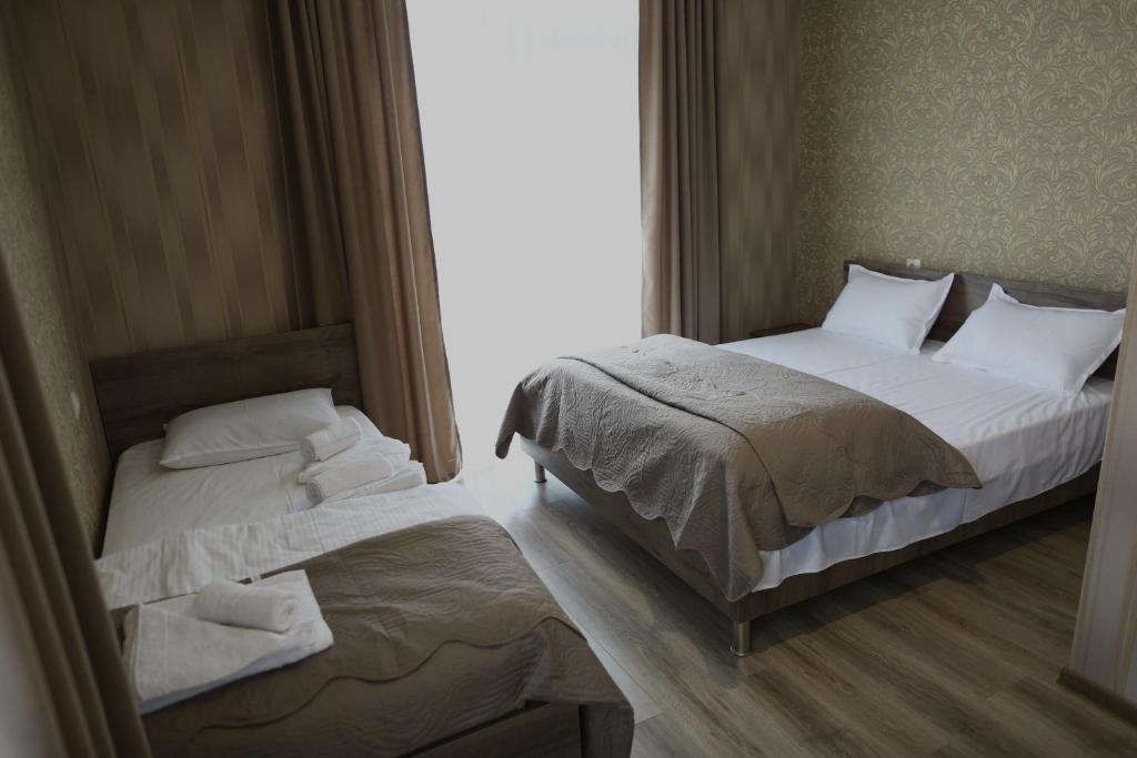 Letto o letti in una camera di Ia's Guest House