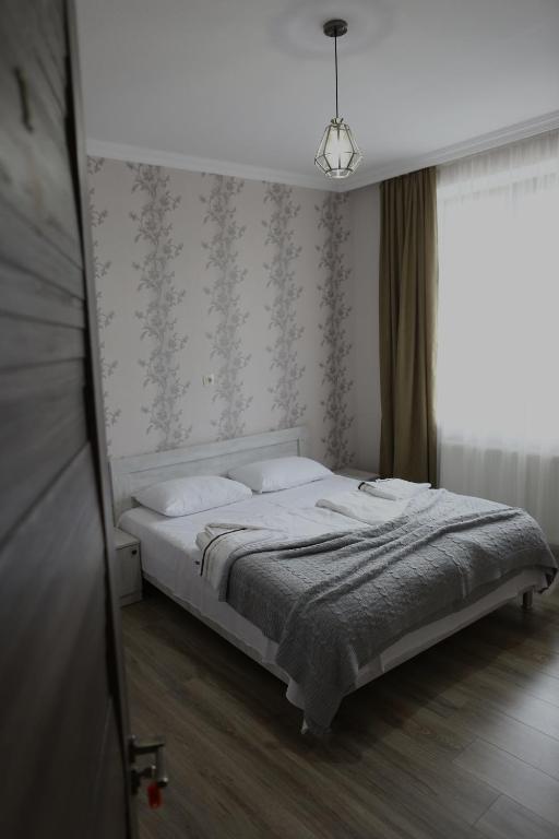 Letto o letti in una camera di Ia's Guest House