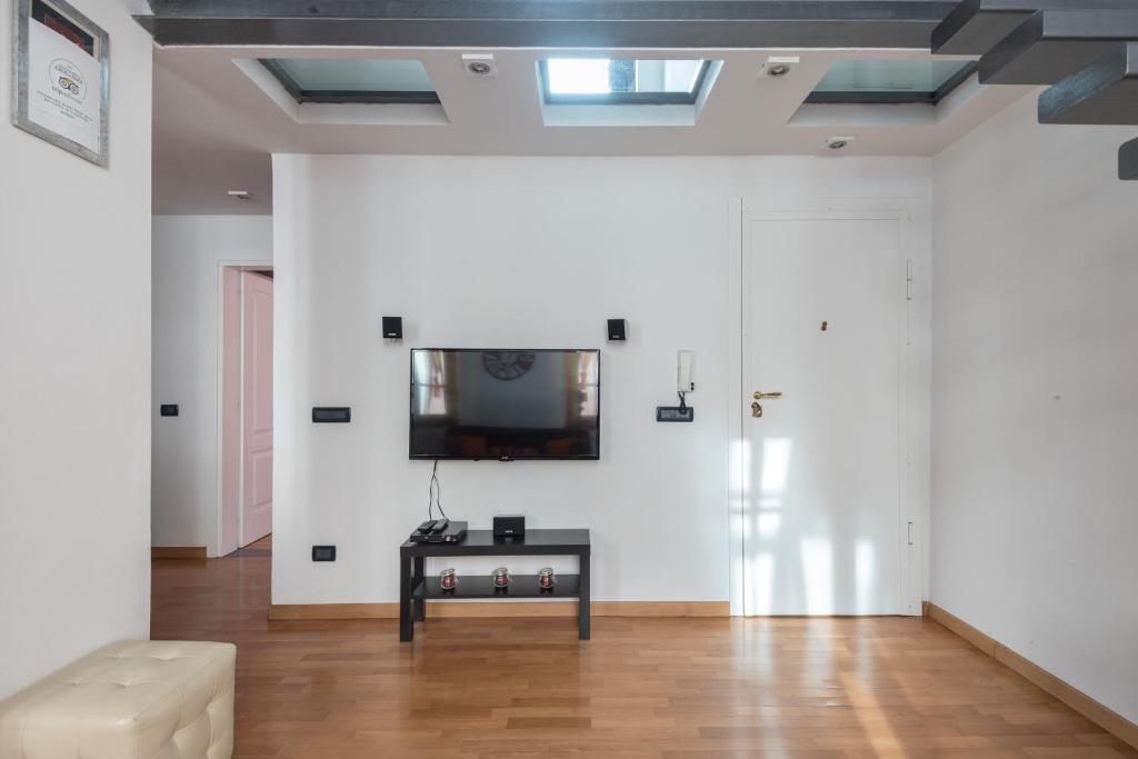 Televízia a/alebo spoločenská miestnosť v ubytovaní Casine 28 apartment