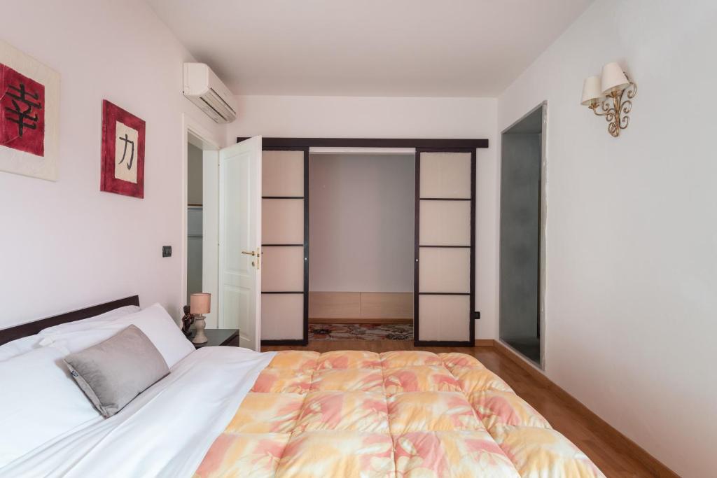 Posteľ alebo postele v izbe v ubytovaní Casine 28 apartment
