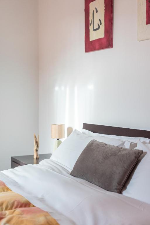 Posteľ alebo postele v izbe v ubytovaní Casine 28 apartment