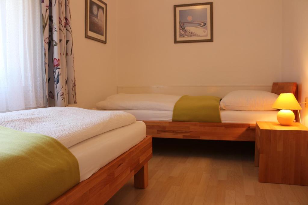 Postel nebo postele na pokoji v ubytování Haus Wegleitner