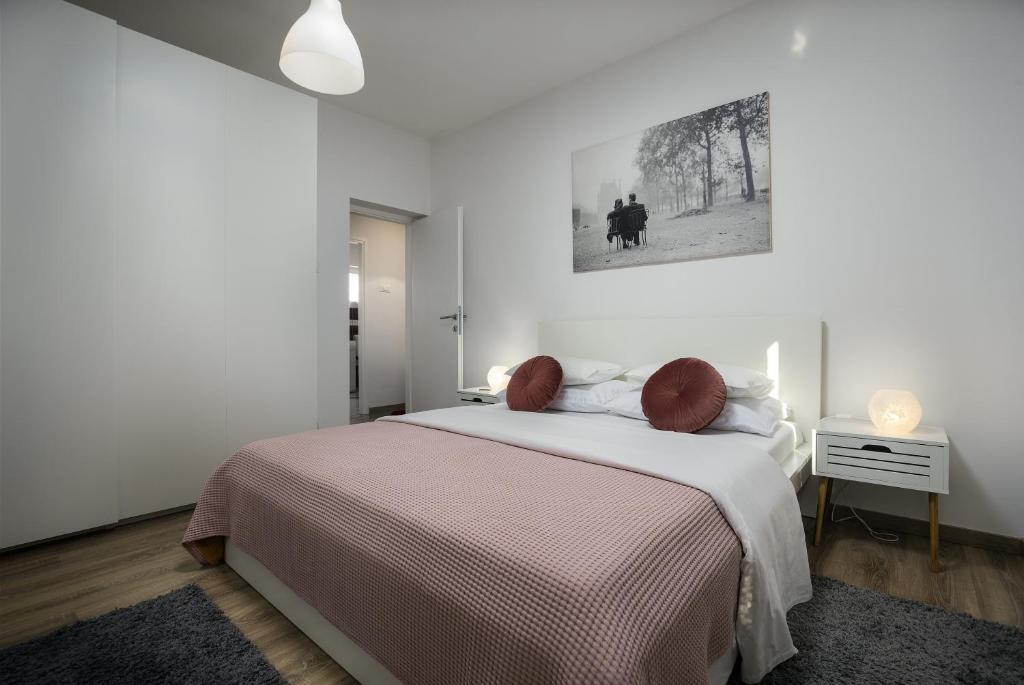 En eller flere senge i et værelse på Apartman Anastazija