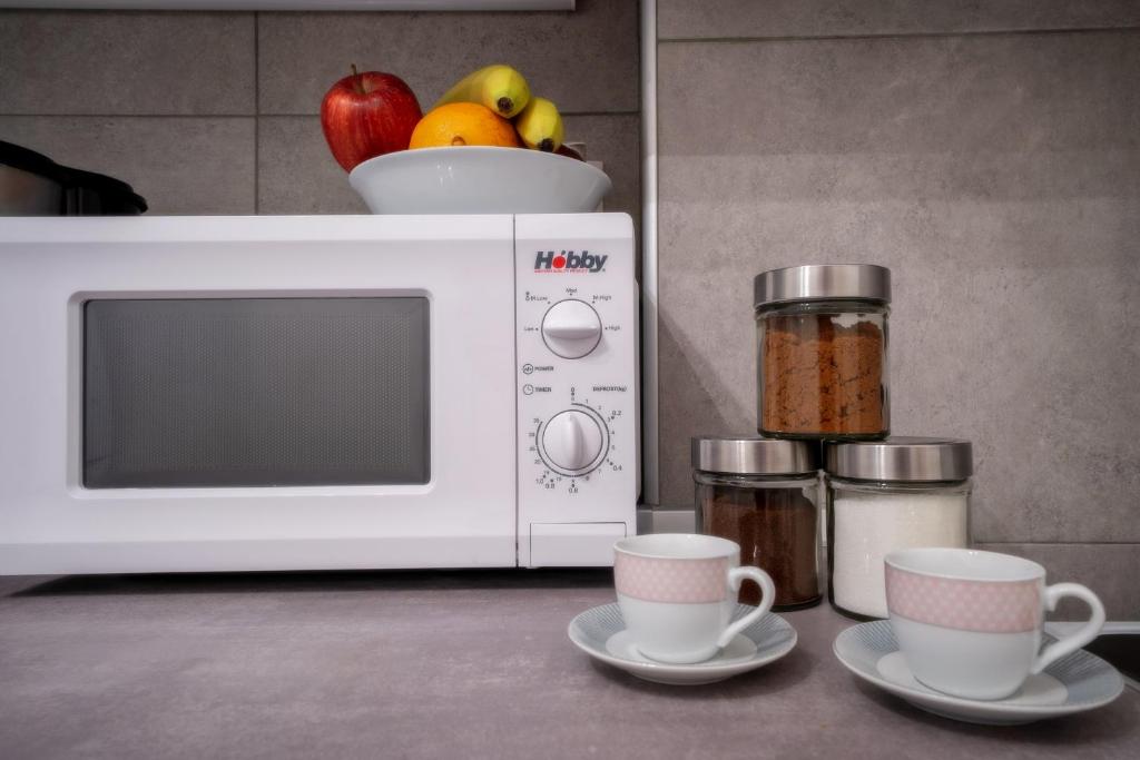 Kuchyňa alebo kuchynka v ubytovaní Acropolis deluxe Apt.(Must)