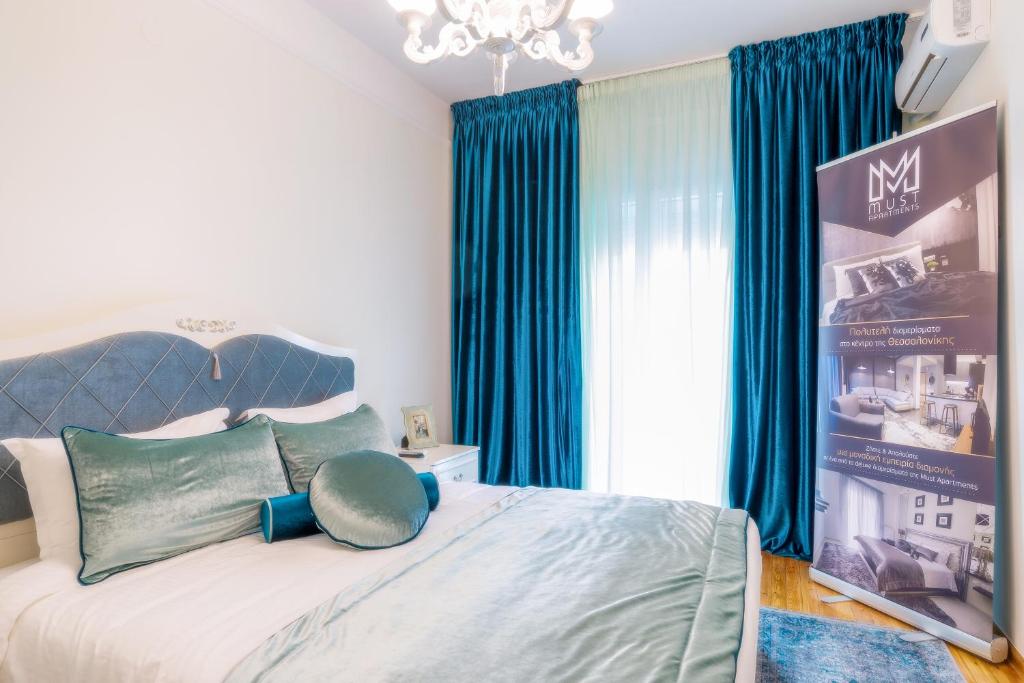 Posteľ alebo postele v izbe v ubytovaní Acropolis deluxe Apt.(Must)