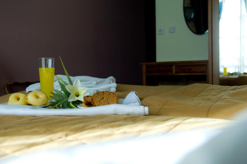 Postel nebo postele na pokoji v ubytování Alkistis Hotel