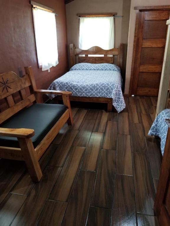 Postel nebo postele na pokoji v ubytování Cabaña Ensueño