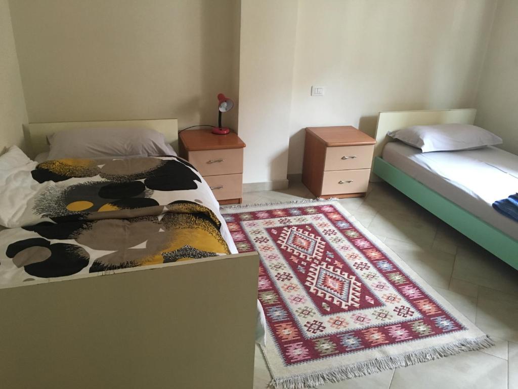 Postel nebo postele na pokoji v ubytování Nina Guest House