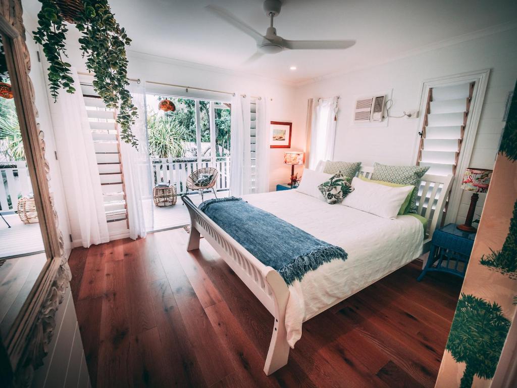 Postel nebo postele na pokoji v ubytování Pandanus Cottage