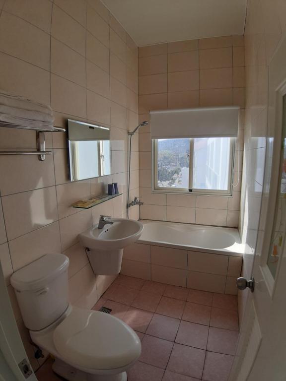 Koupelna v ubytování Hearty Homestay