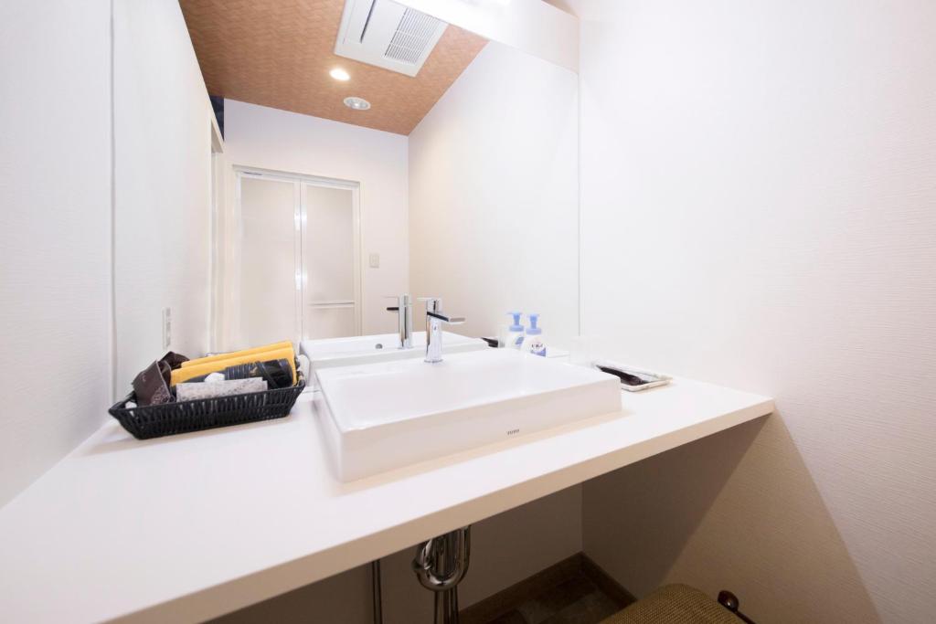 Koupelna v ubytování Hotel Kamogawaso