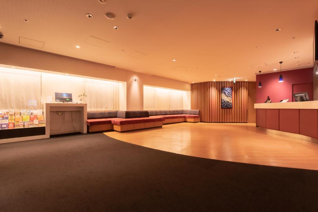 TV a/nebo společenská místnost v ubytování E Hotel Higashi Shinjuku