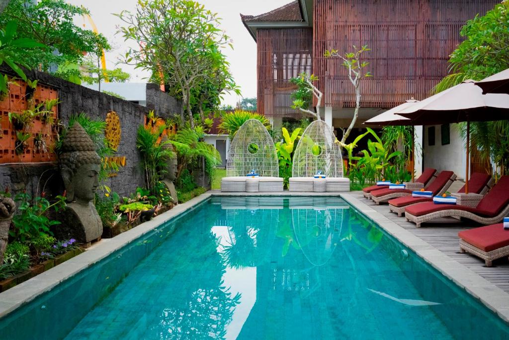 Bazén v ubytování Freddies Resort & Villas Ubud by Kanaya Hospitality nebo v jeho okolí