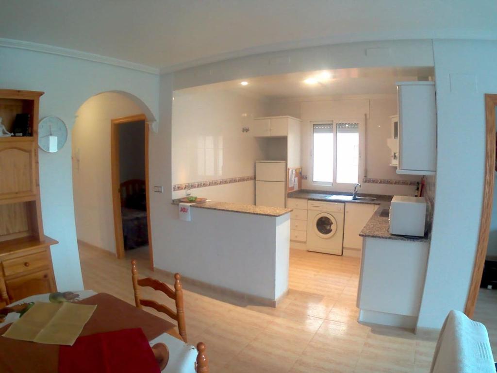 Kuchyň nebo kuchyňský kout v ubytování Apartment Vistamar10