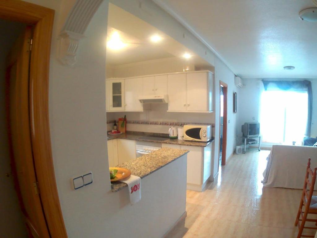 Kuchyň nebo kuchyňský kout v ubytování Apartment Vistamar10