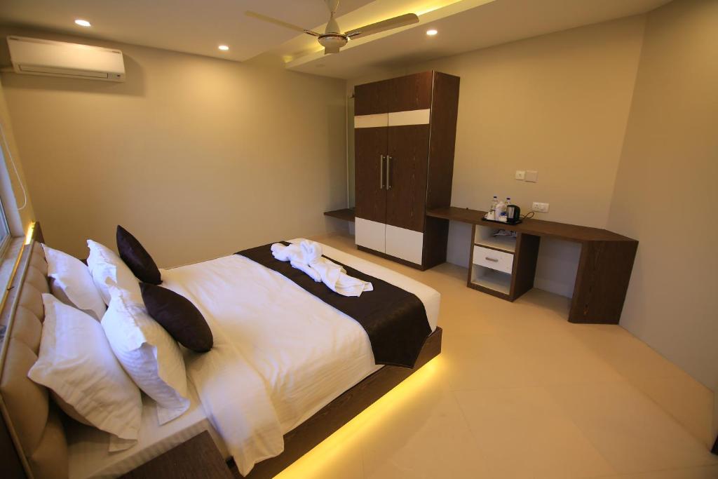 Postel nebo postele na pokoji v ubytování Hotel Le Sapphire