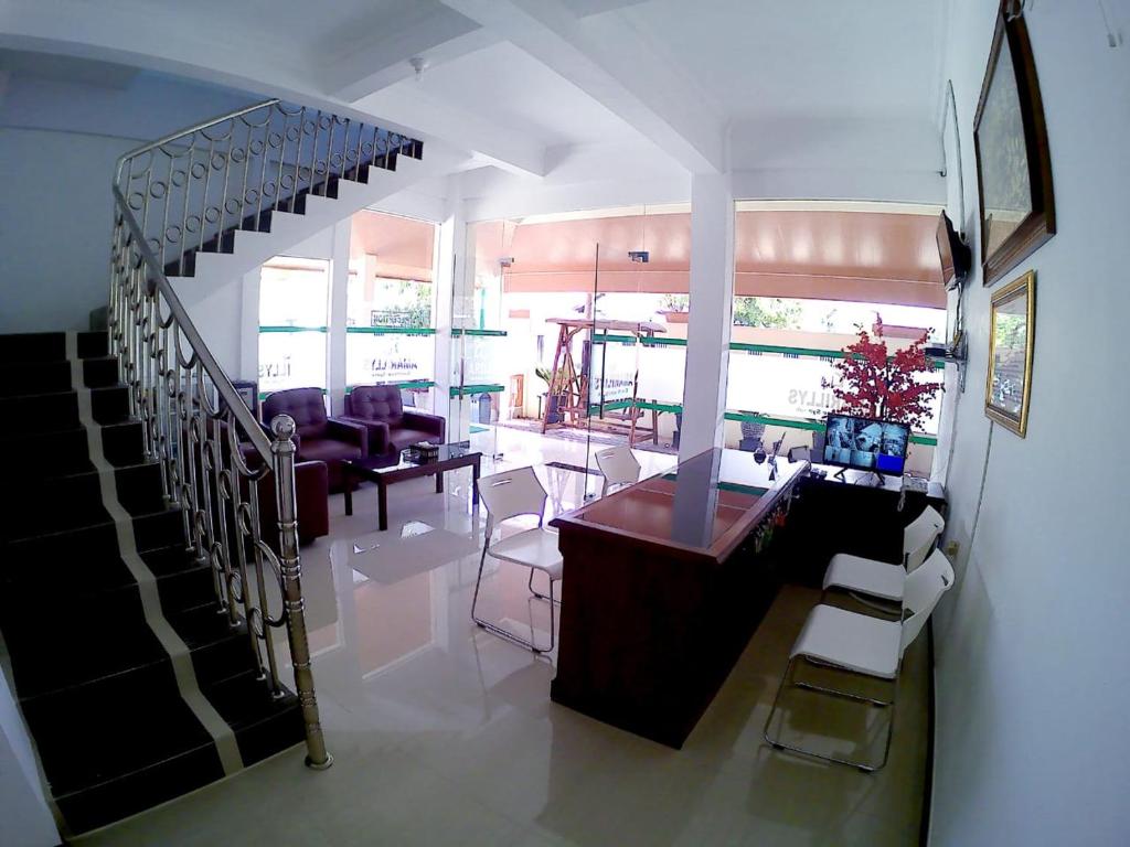 Posezení v ubytování Amaryllis Guesthouse Syariah