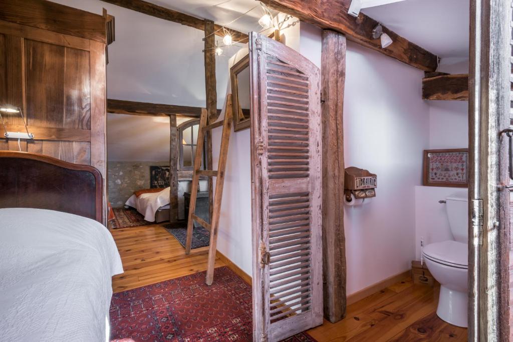 Postel nebo postele na pokoji v ubytování Haras Picard du Sant