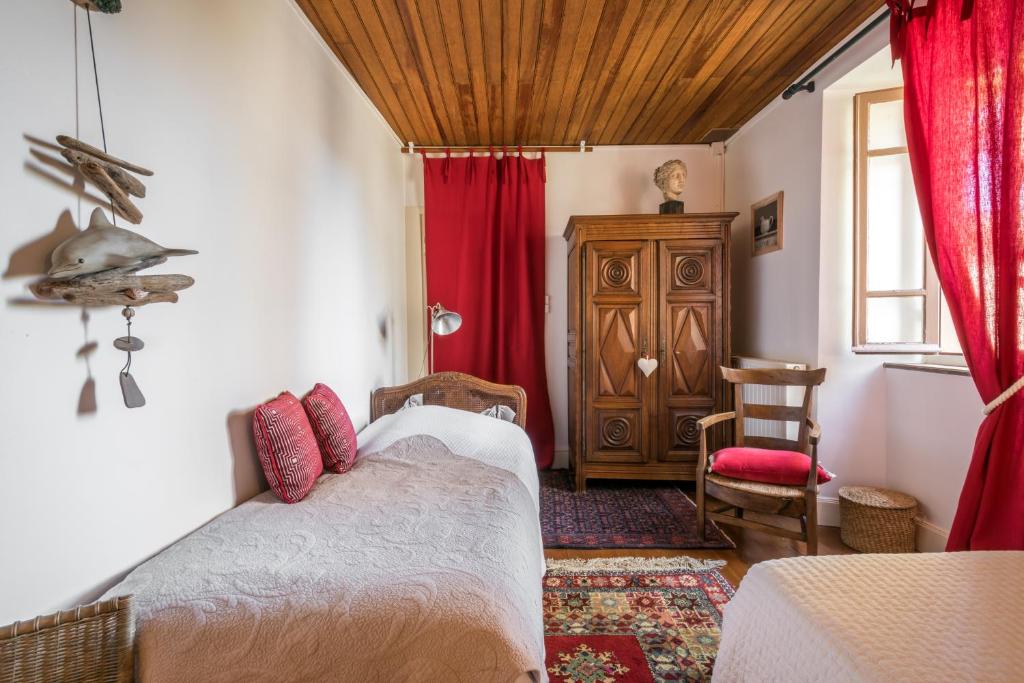 Postel nebo postele na pokoji v ubytování Haras Picard du Sant