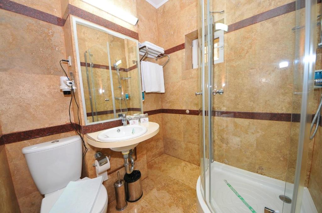 Koupelna v ubytování Hotel Royale
