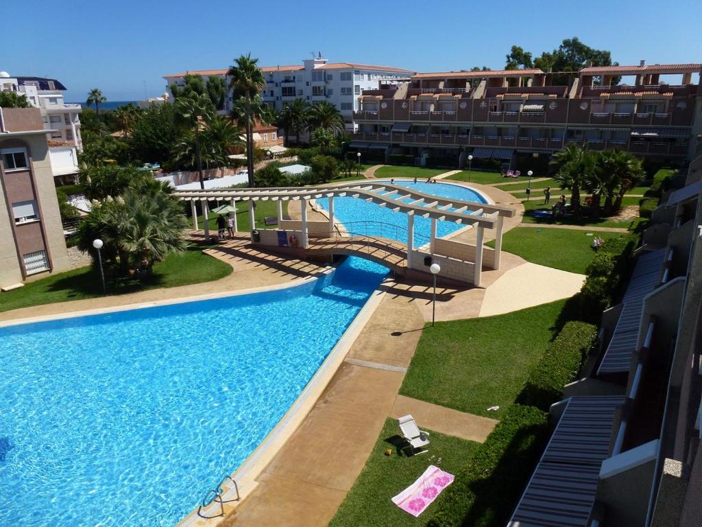 Bazén v ubytovaní Ático Duplex en 1a línea de mar alebo v jeho blízkosti