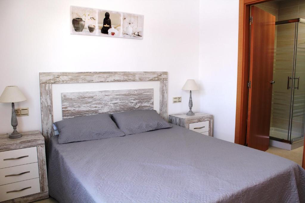 Posteľ alebo postele v izbe v ubytovaní Riumar "Marc", 550m to beach, private pool, On-Site-Service, dog beach