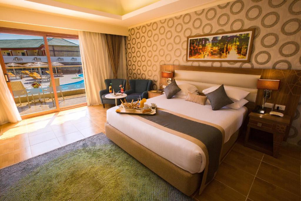 Letto o letti in una camera di Pickalbatros Aqua Blu Sharm El Sheikh