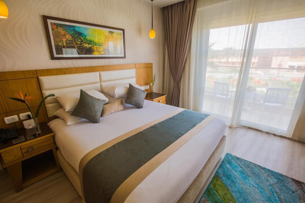 Letto o letti in una camera di Pickalbatros Aqua Blu Sharm El Sheikh
