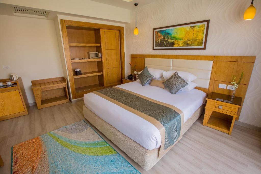 Letto o letti in una camera di Pickalbatros Aqua Blu Sharm El Sheikh