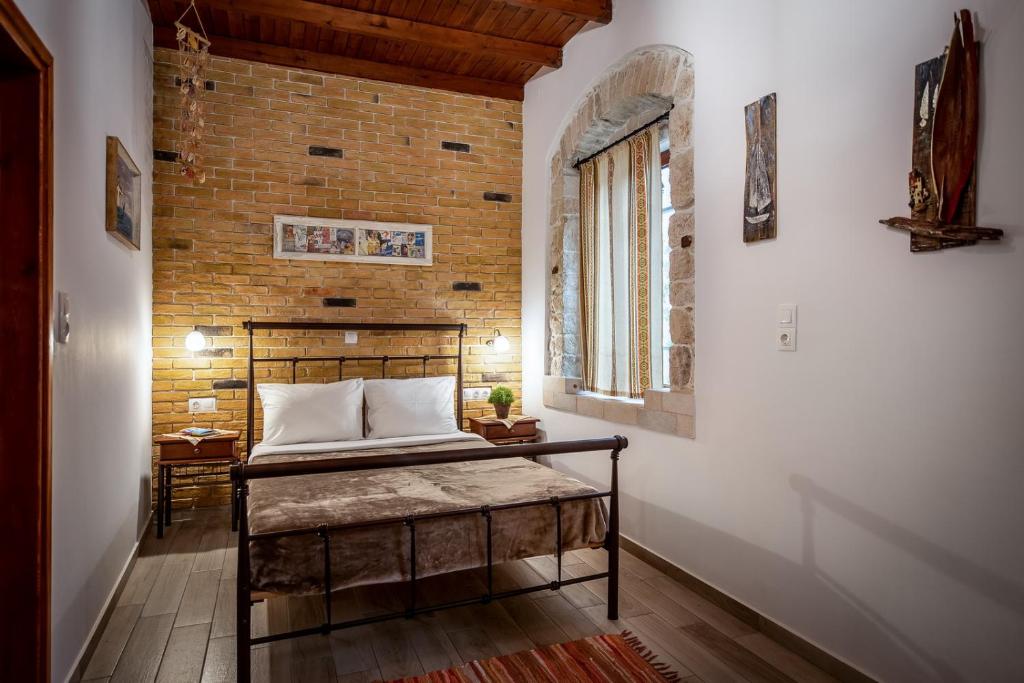 Postel nebo postele na pokoji v ubytování Cretan Villa Hotel