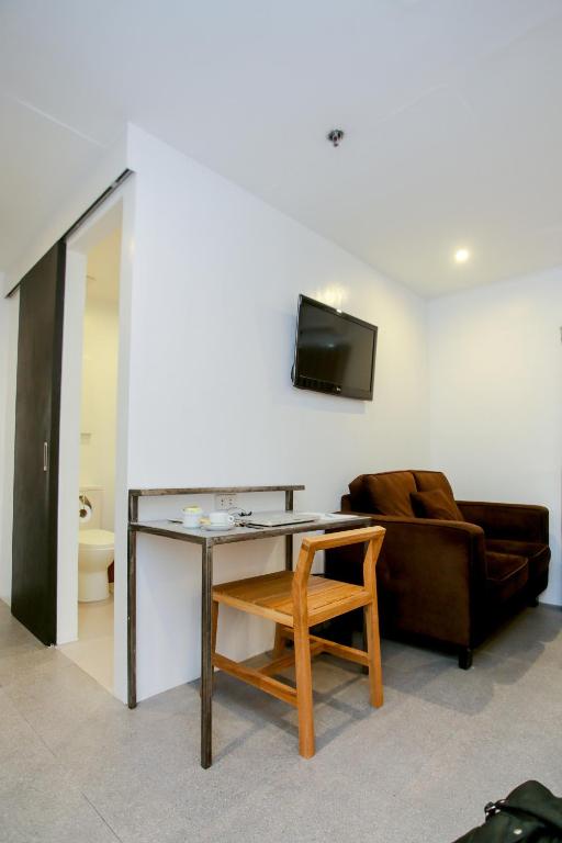 TV a/nebo společenská místnost v ubytování Hotel Durban
