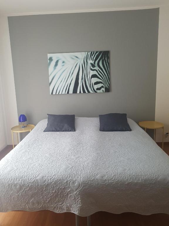 Postel nebo postele na pokoji v ubytování Homestay Dodo