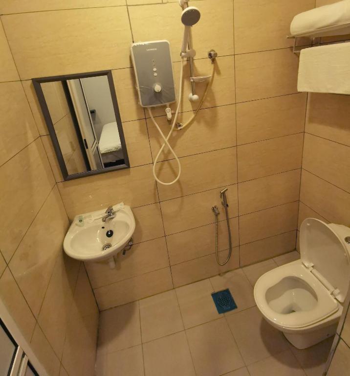 Koupelna v ubytování The Core Hotel