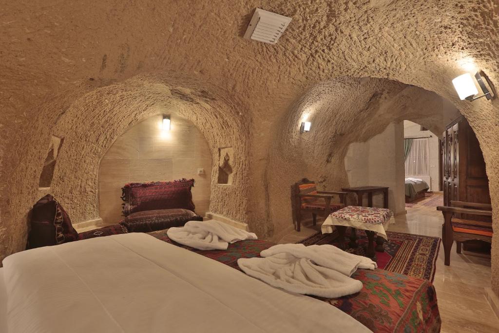 Postel nebo postele na pokoji v ubytování Yoruk Stone House