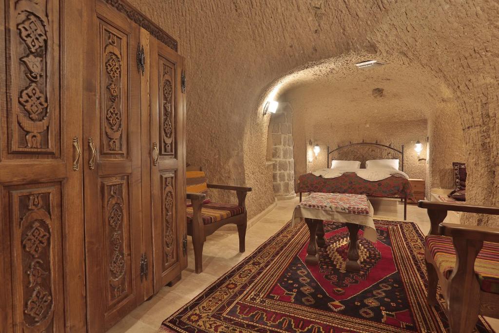 Postel nebo postele na pokoji v ubytování Yoruk Stone House