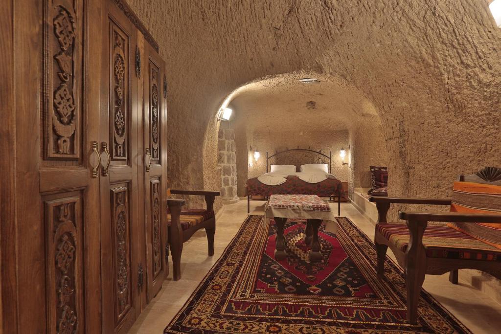 Postel nebo postele na pokoji v ubytování Yoruk Stone House