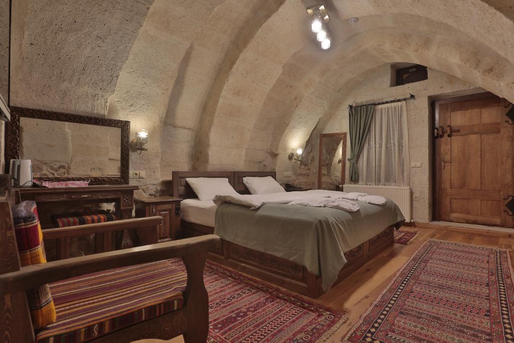 Postel nebo postele na pokoji v ubytování Yoruk Stone House