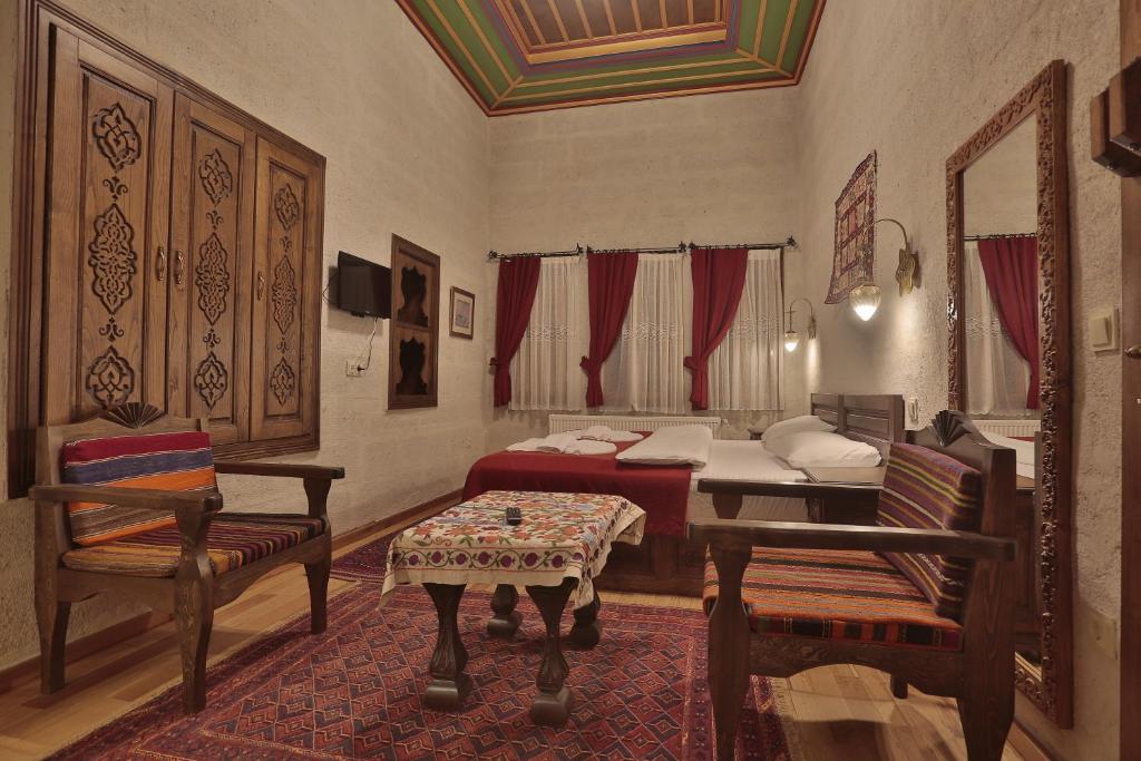 Postel nebo postele na pokoji v ubytování Yoruk Stone House