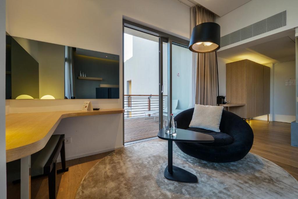 TV a/nebo společenská místnost v ubytování Cramim by Isrotel Exclusive