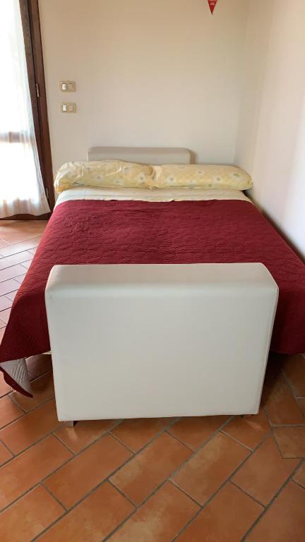 Postel nebo postele na pokoji v ubytování Agriturismo Mimosa