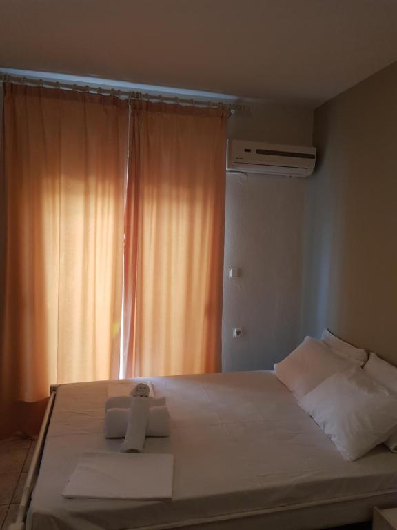 Postel nebo postele na pokoji v ubytování Villa Fallias